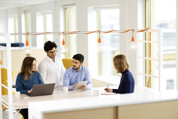 People in work situation, high chairs, orange lamps