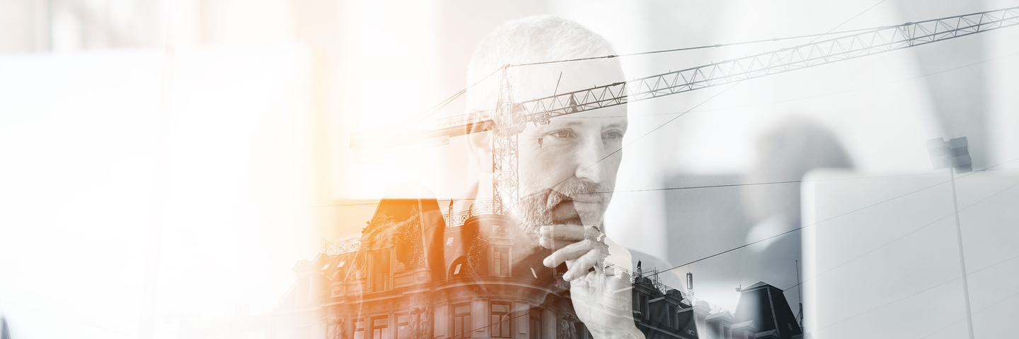 Cropped shot of a mature businessman working at his deska;Information gatewaya;background