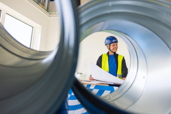 Construction site photo shoot session Experience Center Annica Pettersson Woman through duct